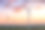 美丽的夕阳在田野上的风车之上图片下载
