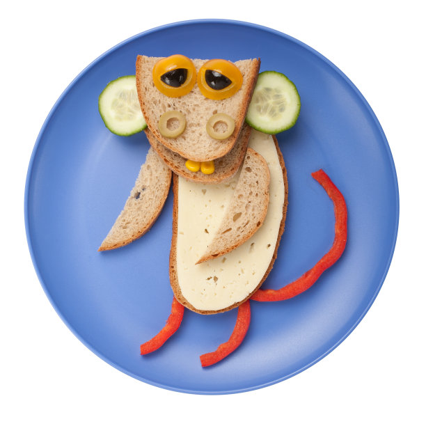 面包，奶酪和蔬菜做成的滑稽猴子图片下载