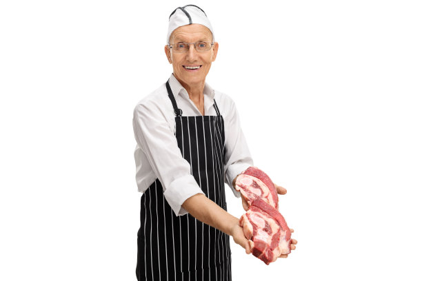 上了年纪的屠夫在卖牛排图片下载