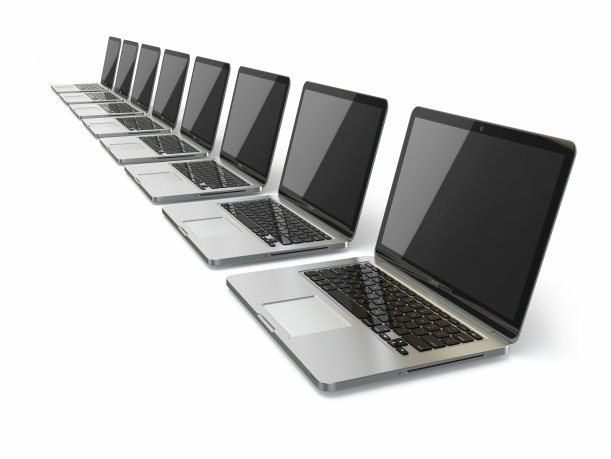 笔记本电脑在白色背景上排成一行图片下载
