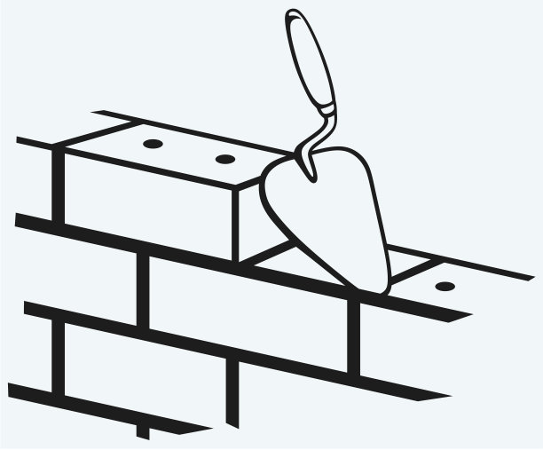 泥铲和砖墙图片下载