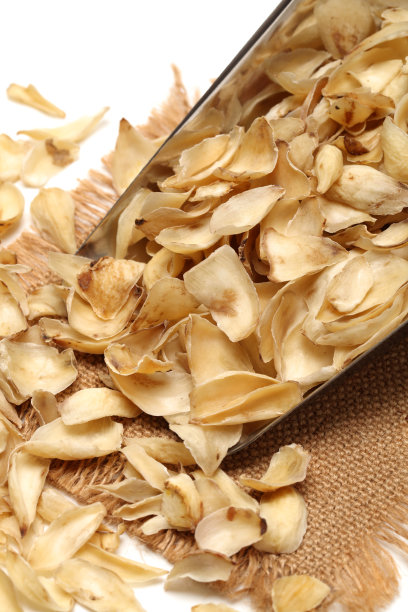 干百合鳞茎，传统中草药在白色背景上分离图片下载