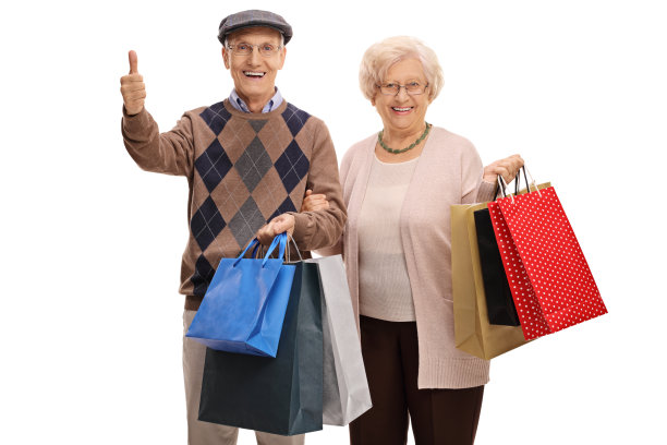 拿着购物袋的老男人和老女人竖起大拇指图片下载