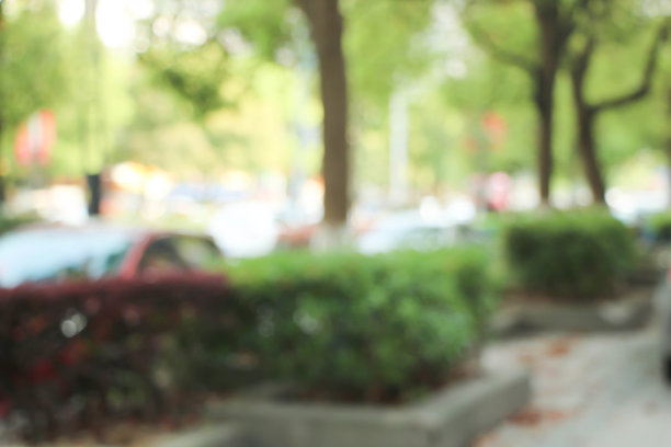 模糊照片的户外停车场在社区购物中心。图片下载