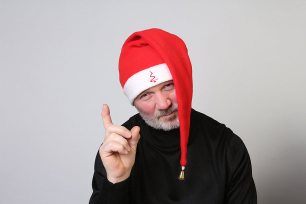 圣诞老人表情与滑稽的红帽子图片下载