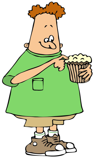 男孩在吃纸杯蛋糕图片下载