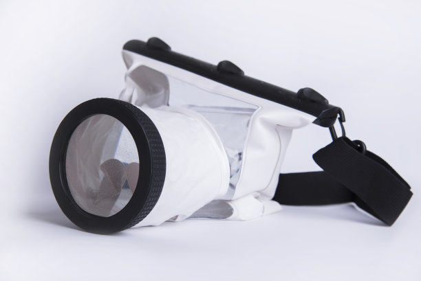 防水的情况下，数码相机的白色背景，夏季配件的摄影师图片下载