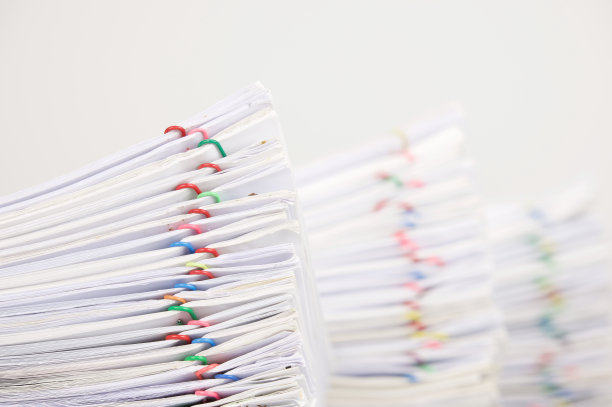 成堆的文件模糊了超负荷的文件作为背景图片下载