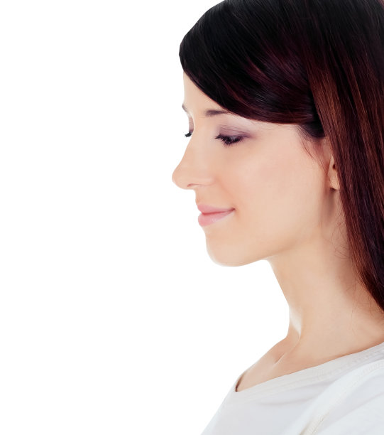 侧面的美丽的年轻女子孤立在白色图片下载