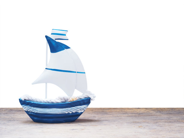 白色和蓝色的帆船玩具图片下载