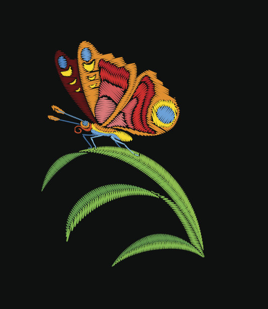 绣红蝴蝶坐在绿草上。图片下载