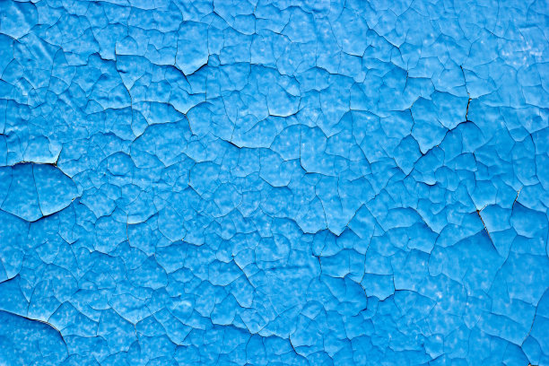 混凝土墙上破旧的蓝色油漆的纹理图片下载