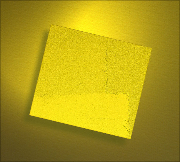 黄色的纸在金色的背景图片下载