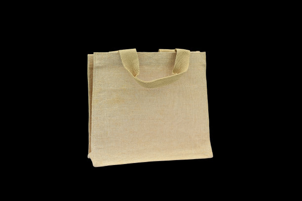 购物袋由回收黑森袋在黑色的背景。图片下载