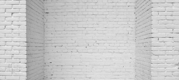 用白漆涂的砖墙。图片下载