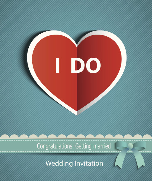 带丝带的心型纸的婚礼卡片。图片下载