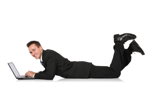 商人躺在前面用笔记本电脑图片下载
