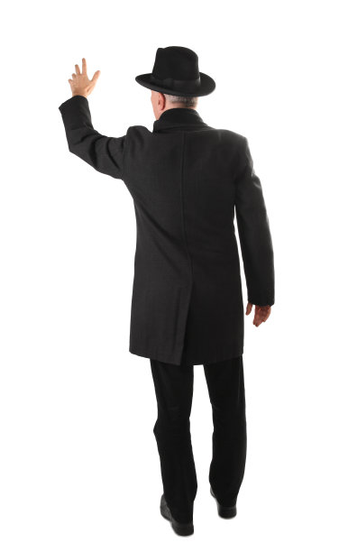 有个人举起手招呼出租车后视图图片下载