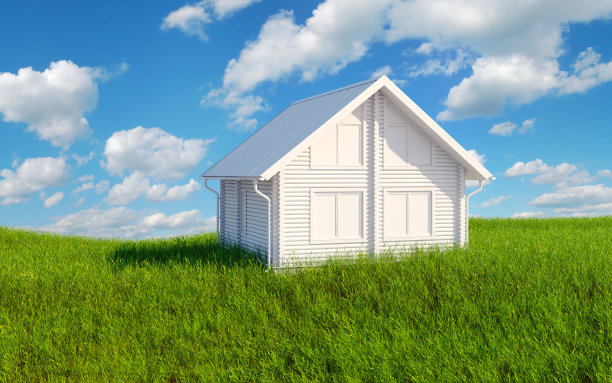 绿色的草地上点缀着白色的建筑物图片下载