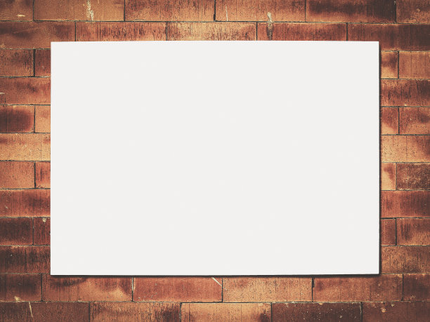 白色的床单和砖墙图片下载