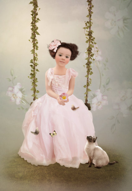 穿着粉红色裙子的女孩和小猫图片下载