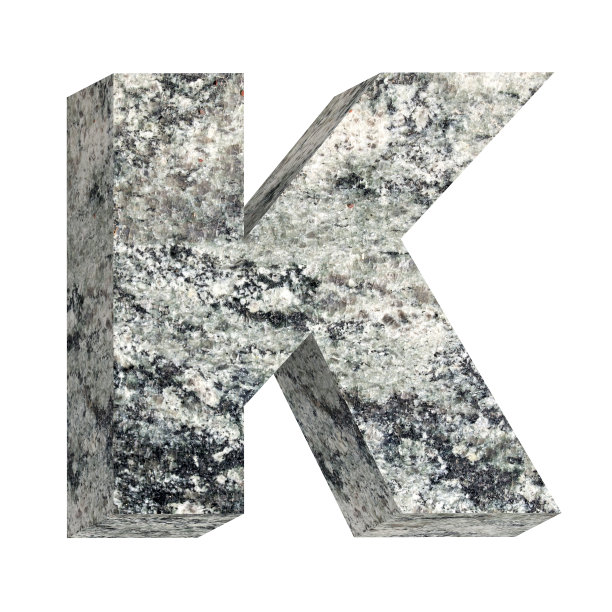 一个来自花岗岩字母表的字母被孤立在白色之上。图片下载