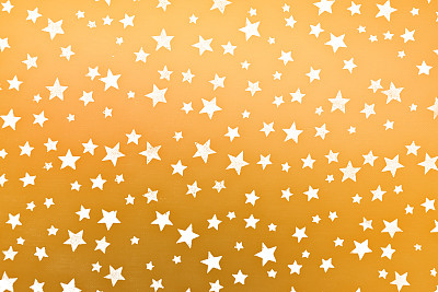 金色背景上的小白星星图片下载