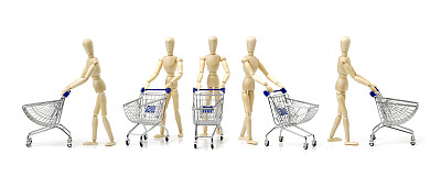 木制娃娃和金属购物车。图片下载