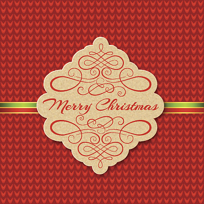 针织背景与圣诞标签。贺卡。图片下载