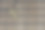 金十字架在柳条垫子上图片下载