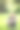 年轻人坐在公园的草地上图片下载