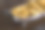不锈钢盘子里的鳕鱼饼。图片下载