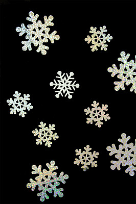 雪花孤立在黑色背景上图片下载