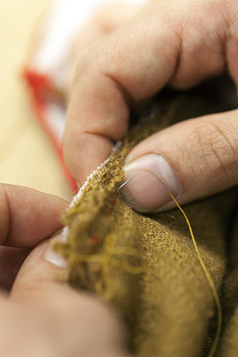 用针缝制纺织品的边缘图片下载