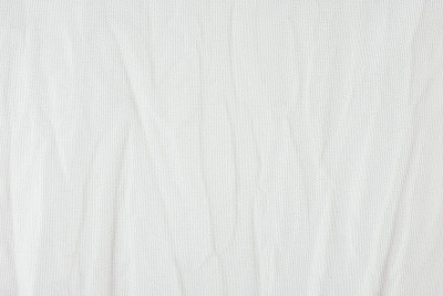 褶皱白色帆布织物纹理。图片下载