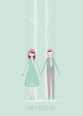 男孩和女孩在冬天手牵着手。图片下载