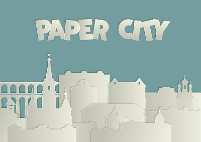 旧城的全景。在蓝色背景上剪出白色的题字“纸城市”。图片下载