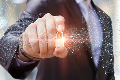 保安锁在商人手中。图片下载