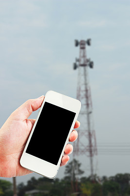 手拿着智能手机图片下载