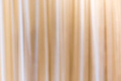 抽象模糊照片波纹纹理窗帘背景在豪华酒店。图片下载