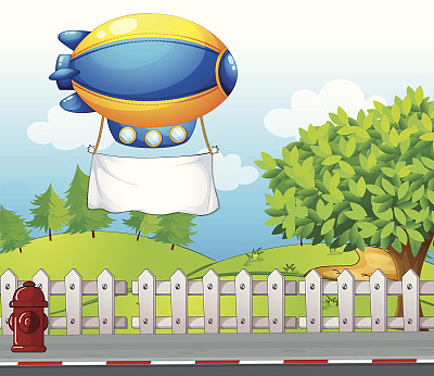 挂着旗帜的飞艇停在路边图片下载