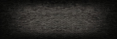黑色砖墙全景背景。图片下载