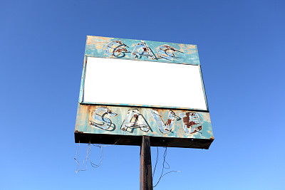 老生锈的节省气体标志图片下载