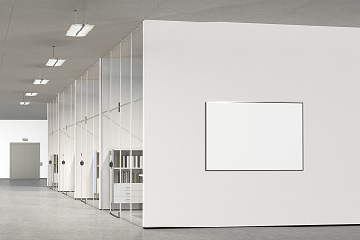 现代办公室墙上的空白海报图片下载