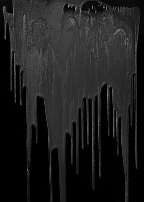 灰色油漆滴在黑色背景上图片下载