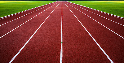 新的跑步轨迹与绿草抽象，纹理，背景。图片下载