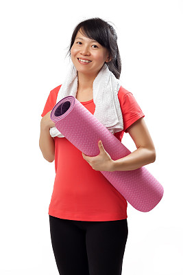 有瑜伽垫的健康女人图片下载