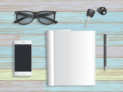 用桌上的钢笔、手机和汽车钥匙打开书图片下载