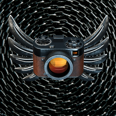 带金属翅膀的老式胶卷相机图片下载