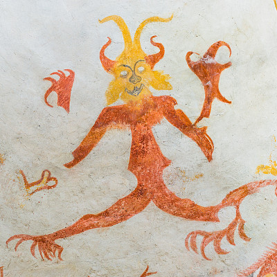有着大爪子的恶魔，中世纪的壁画图片下载